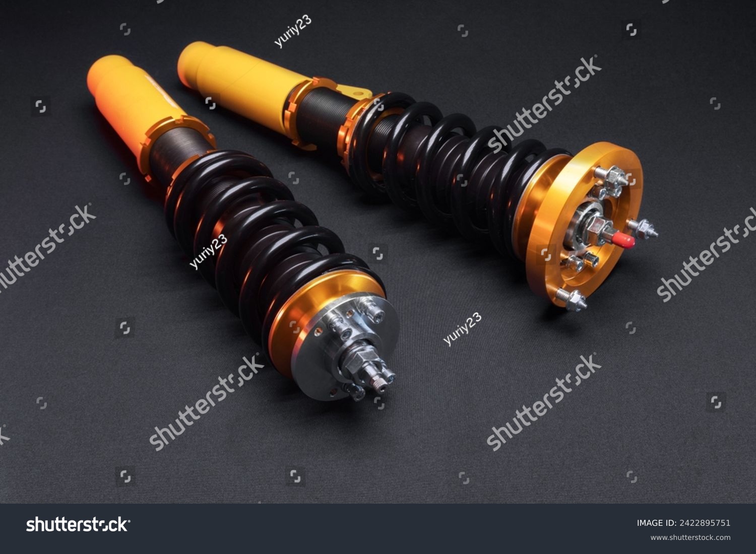 suspension tuning, coilovers, shock absorbers and front springs in yellow and gold colors for a sports drift car on a dark background	 #2422895751