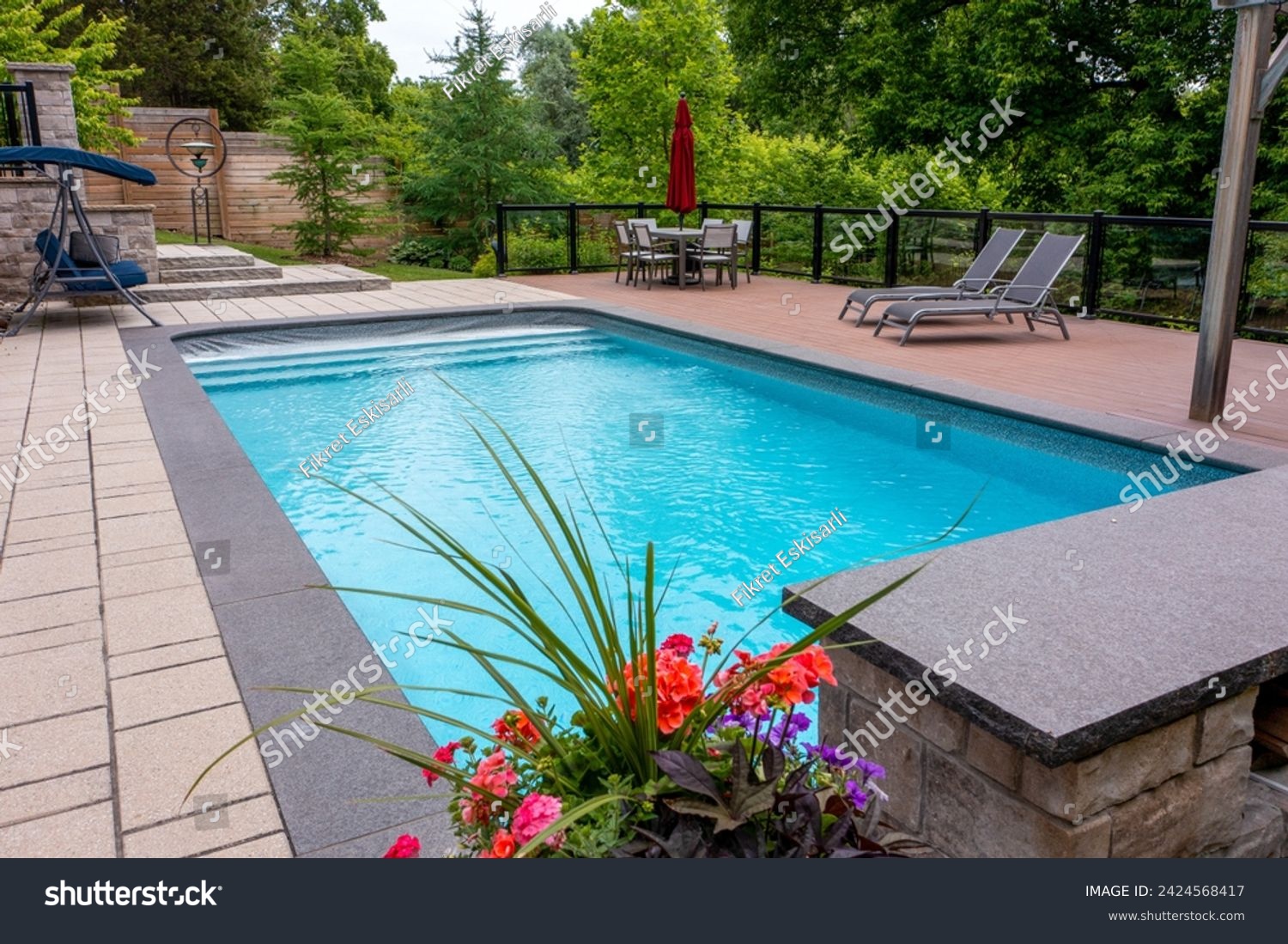 Dive into luxury with breathtaking backyard pool designs. Transform your outdoor space into a paradise with our stunning pool photography #2424568417