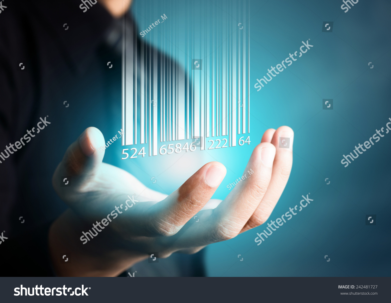 Barcode dropping on businessman hand, financial concept #242481727