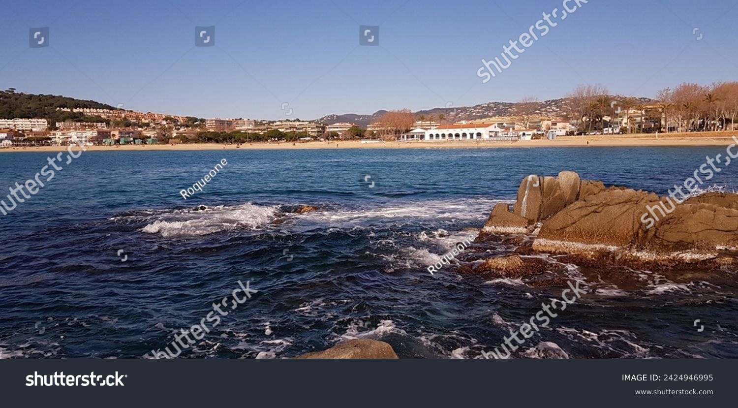 beach rocks blue sea catalunia coast #2424946995