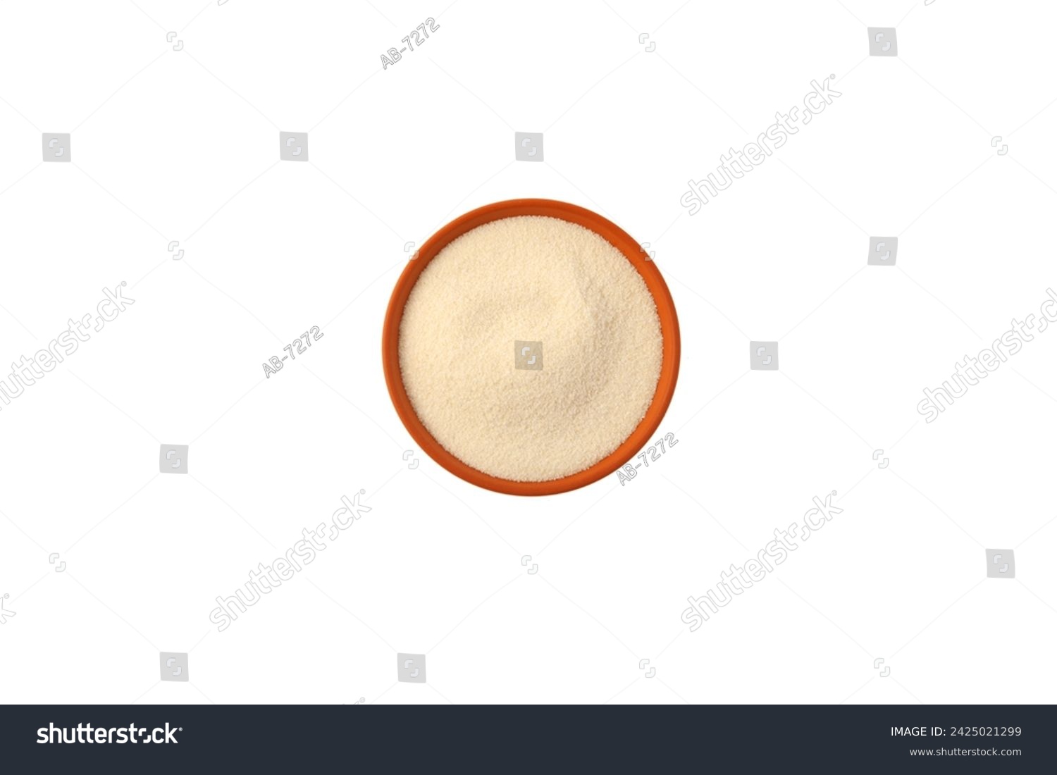 Wheat Semolina on ceramic plate on white background, top view. Organic Semolina powder. Design element, copy space. #2425021299