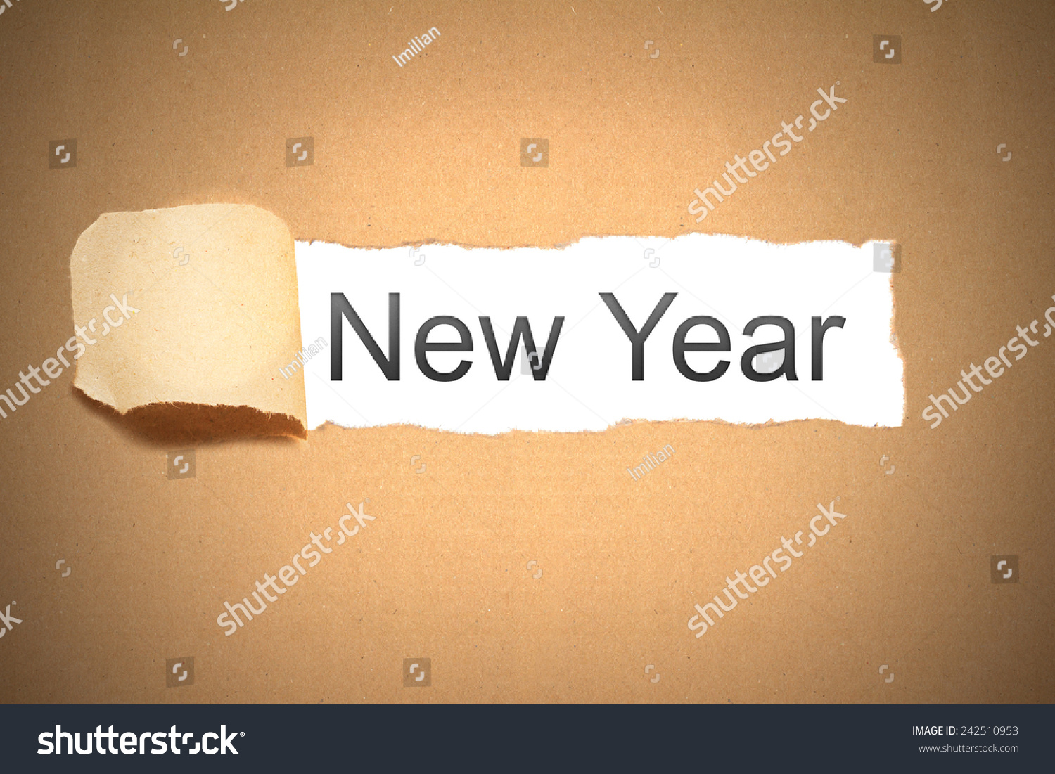 brown packaging paper torn to reveal new year #242510953