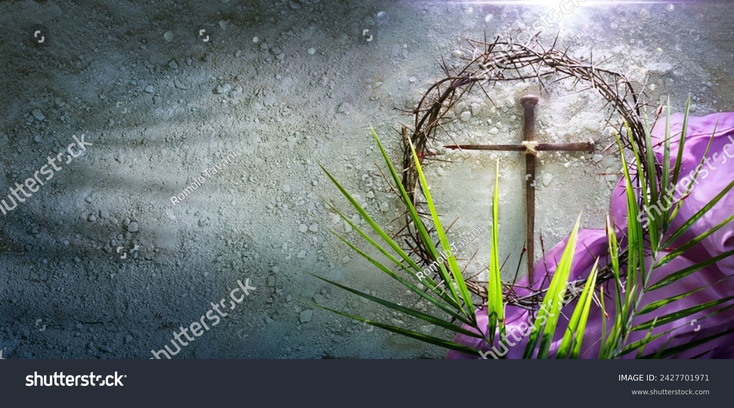 Lenten -  Crown Of Thorns and Cross With Purple Robe On Ash - Palm Leaves And Bloody Spikes For Penitence Concept With Abstract Sunlight #2427701971