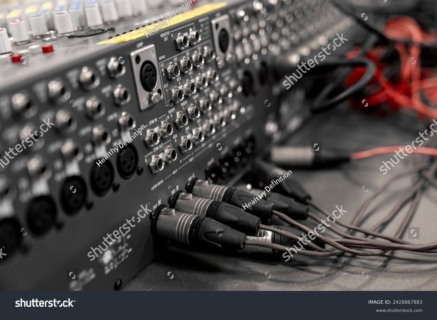 Mixer control. Music engineer. Backstage controls on an audio mixer, Sound mixer. Professional audio mixing console with lights, buttons, faders and sliders. sound check for concert. #2428867883
