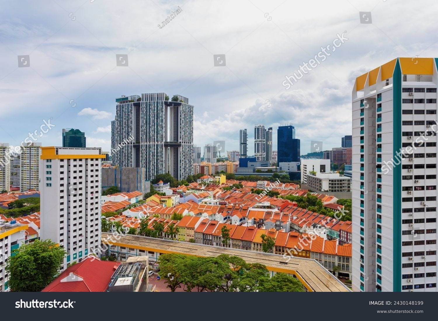 Modern and Traditional Skyline in Singapore, Contrast between historical shophouses and modern high-rise buildings in Singapore's dynamic urban landscape. #2430148199