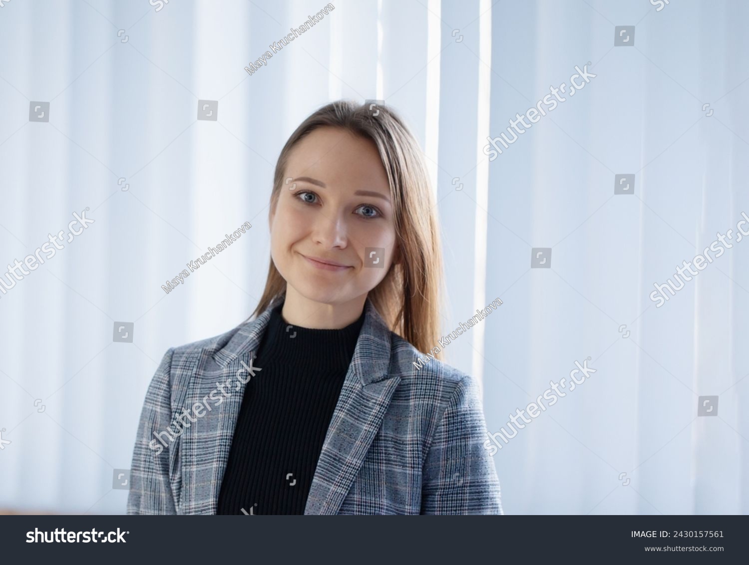 young happy businesswoman in office #2430157561