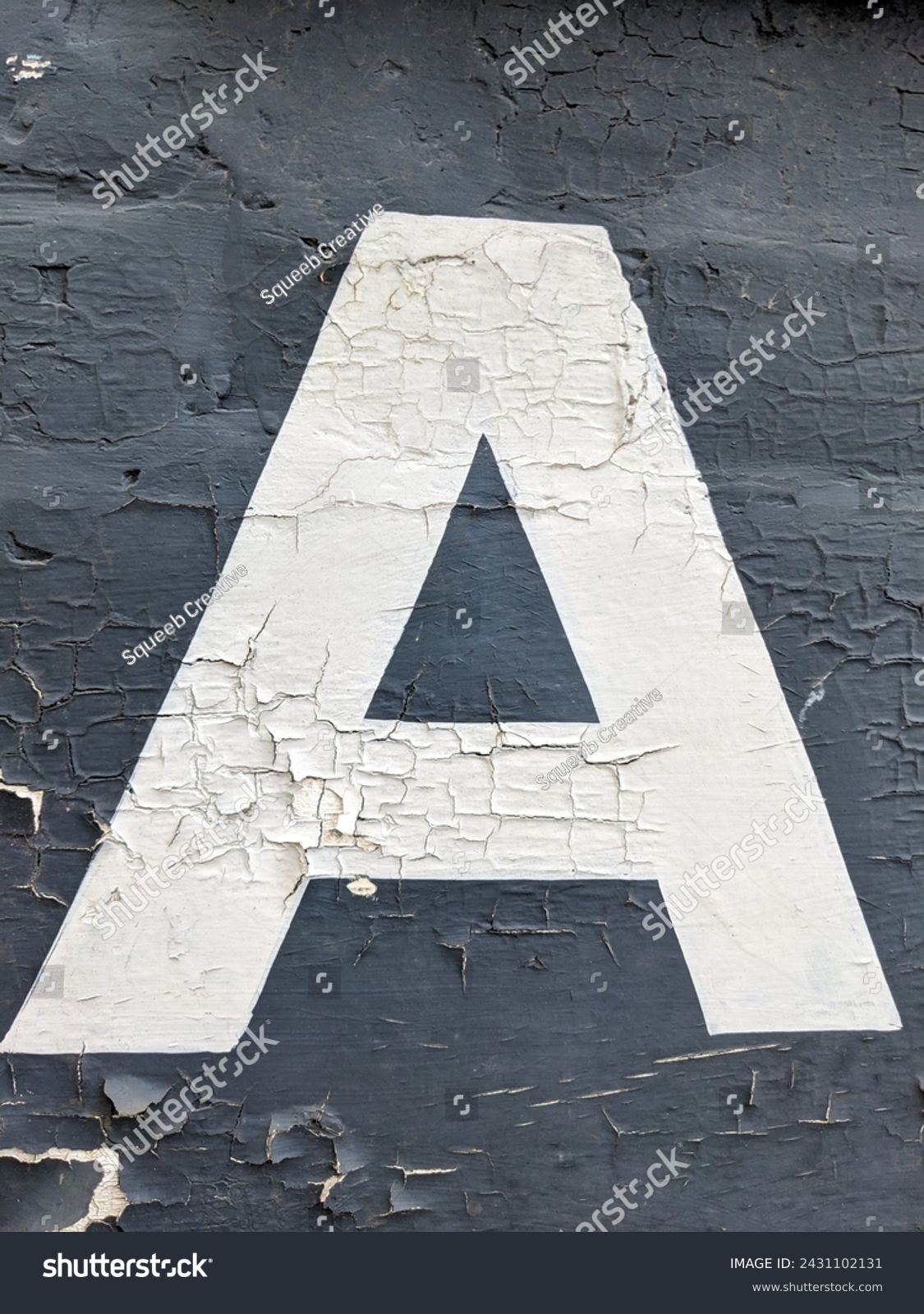 A Written Wording in Distressed State Typography Found Number Letter #2431102131