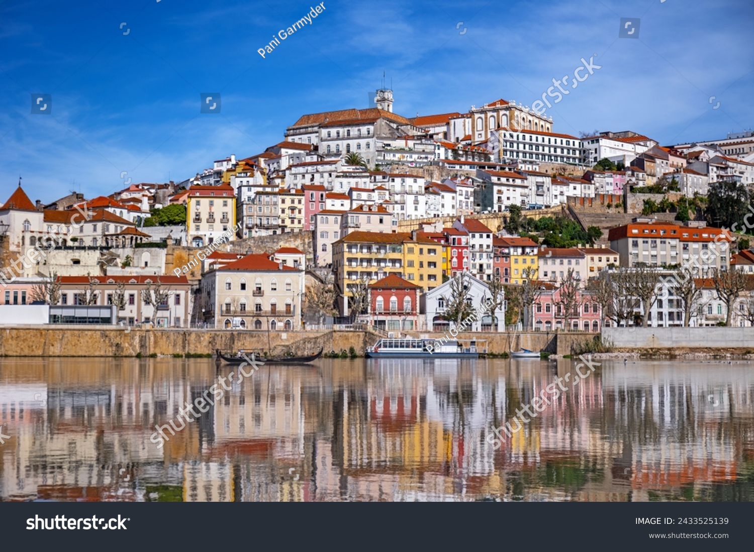 A picturesque panorama of Coimbra with the reflection in the Mondego river #2433525139