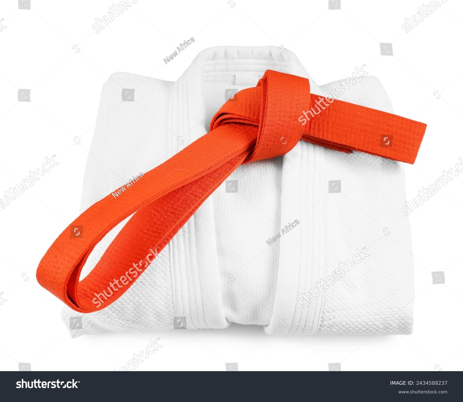 Martial arts uniform with orange belt isolated on white #2434588237