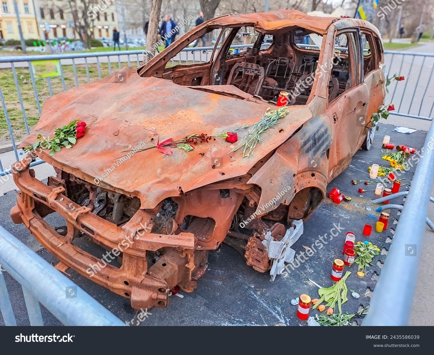 burned-out civilian car. War in Ukraine. Russian invasion of Ukraine. War crimes #2435586039
