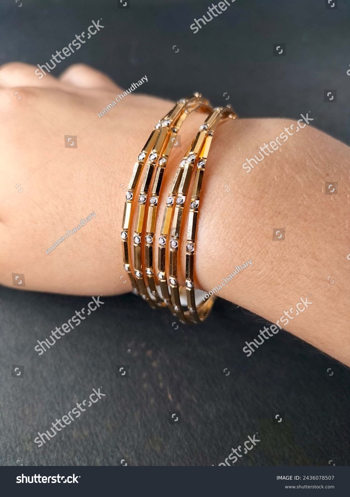 Exquisite diamond and gold bangles, epitomizing elegance and luxury. Crafted with precision and adorned with brilliance, a timeless adornment for any occasion. #2436078507