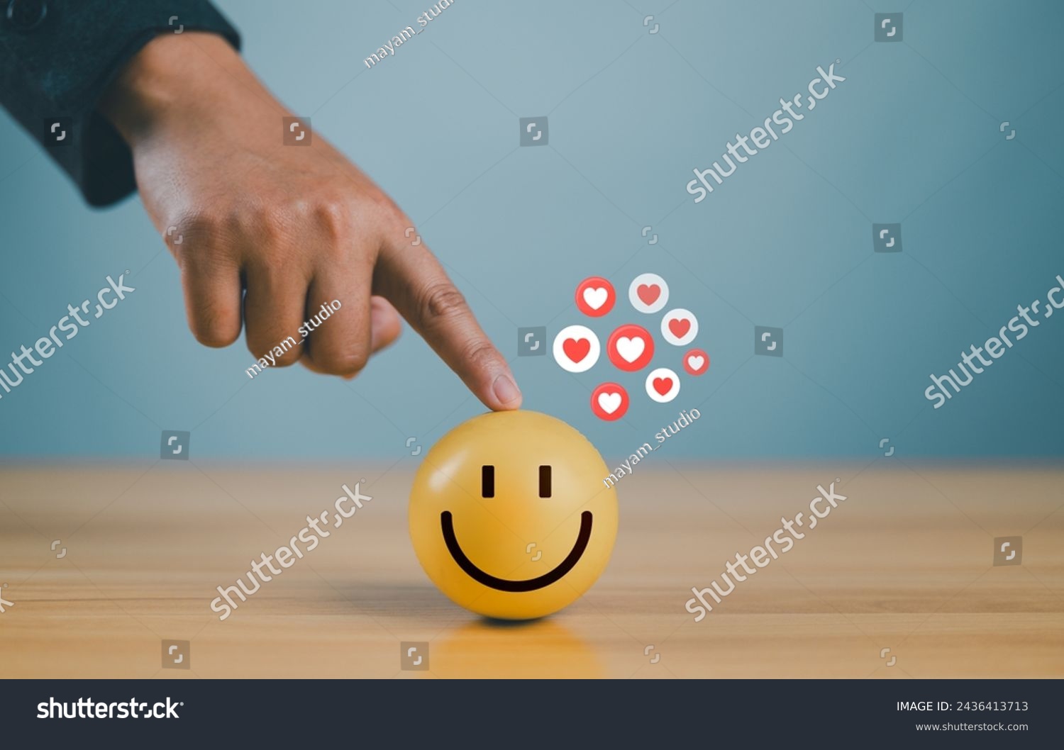 Hand with happy smiley face emotion on wooden circle. Customer service satisfaction, Positive thinking and mental health assessment, Happy client give feedback experience with rating very impressive. #2436413713
