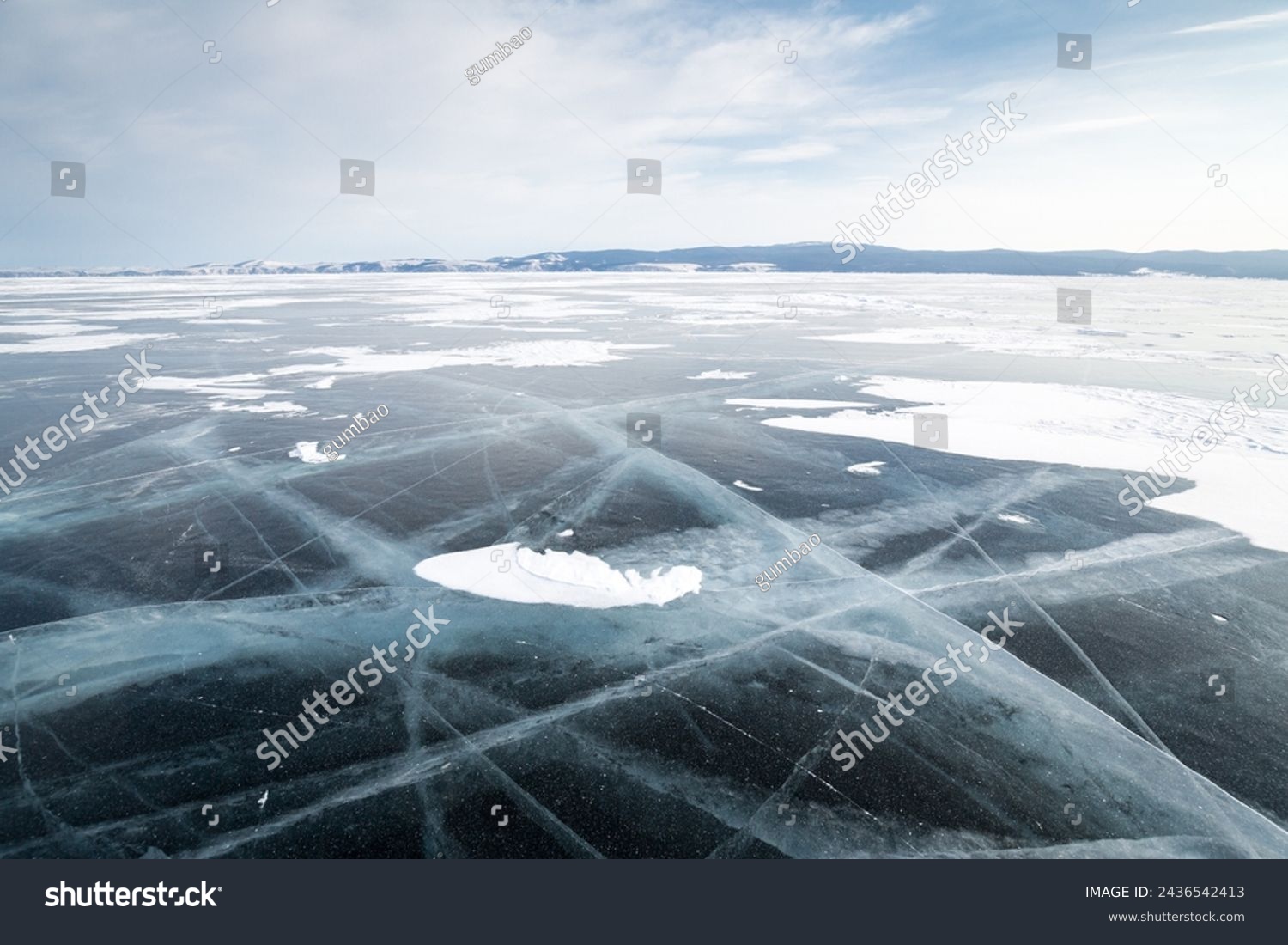 Lake Baikal in winter, the deepest and largest freshwater lake by volume in the world, located in southern Siberia, Russia #2436542413