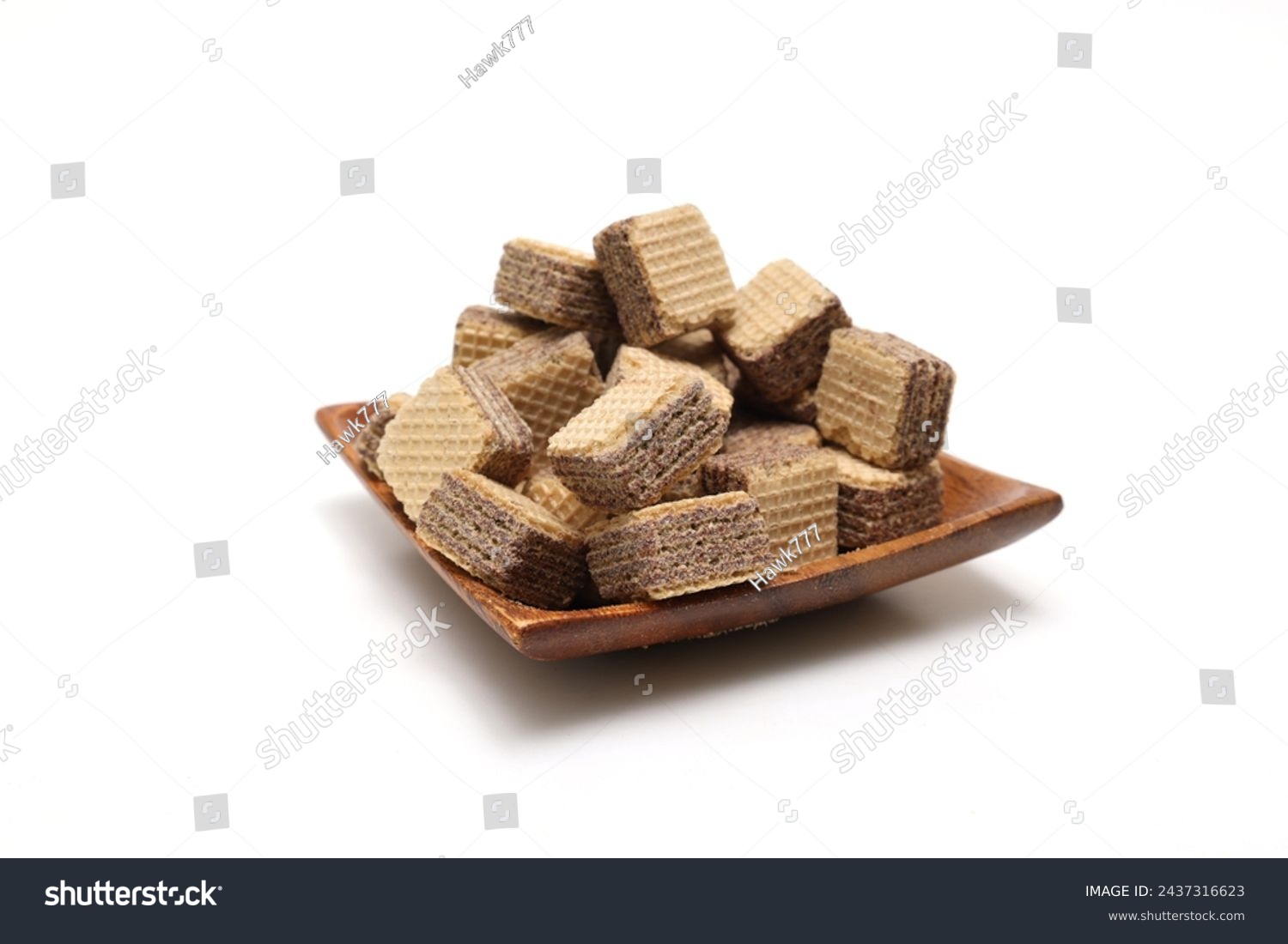Bite-size wafers isolated on a white background. #2437316623