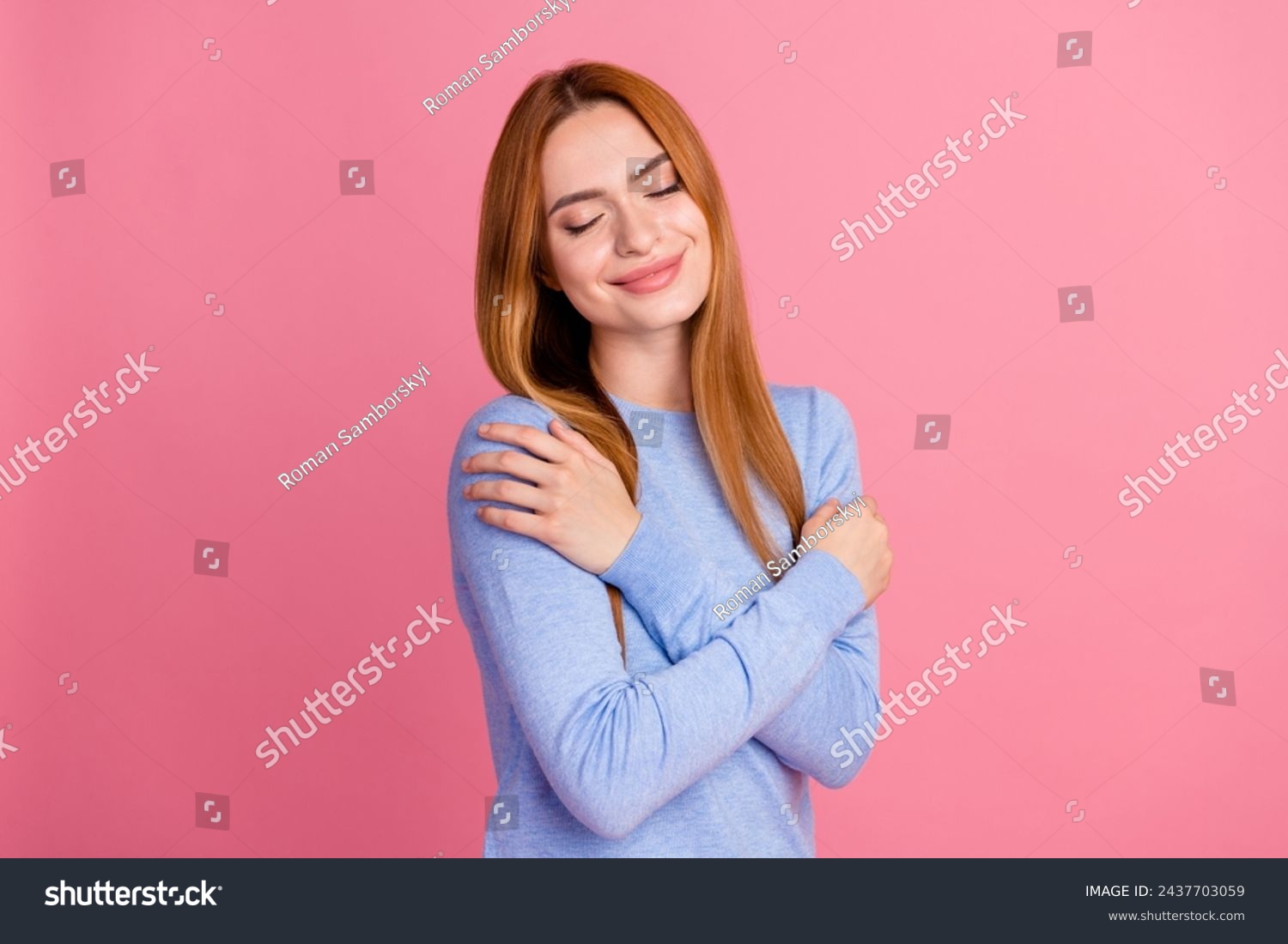 Portrait of satisfied adorable girl with foxy hairdo wear blue pullover hug herself enjoy fresh clothes isolated on pink color background #2437703059