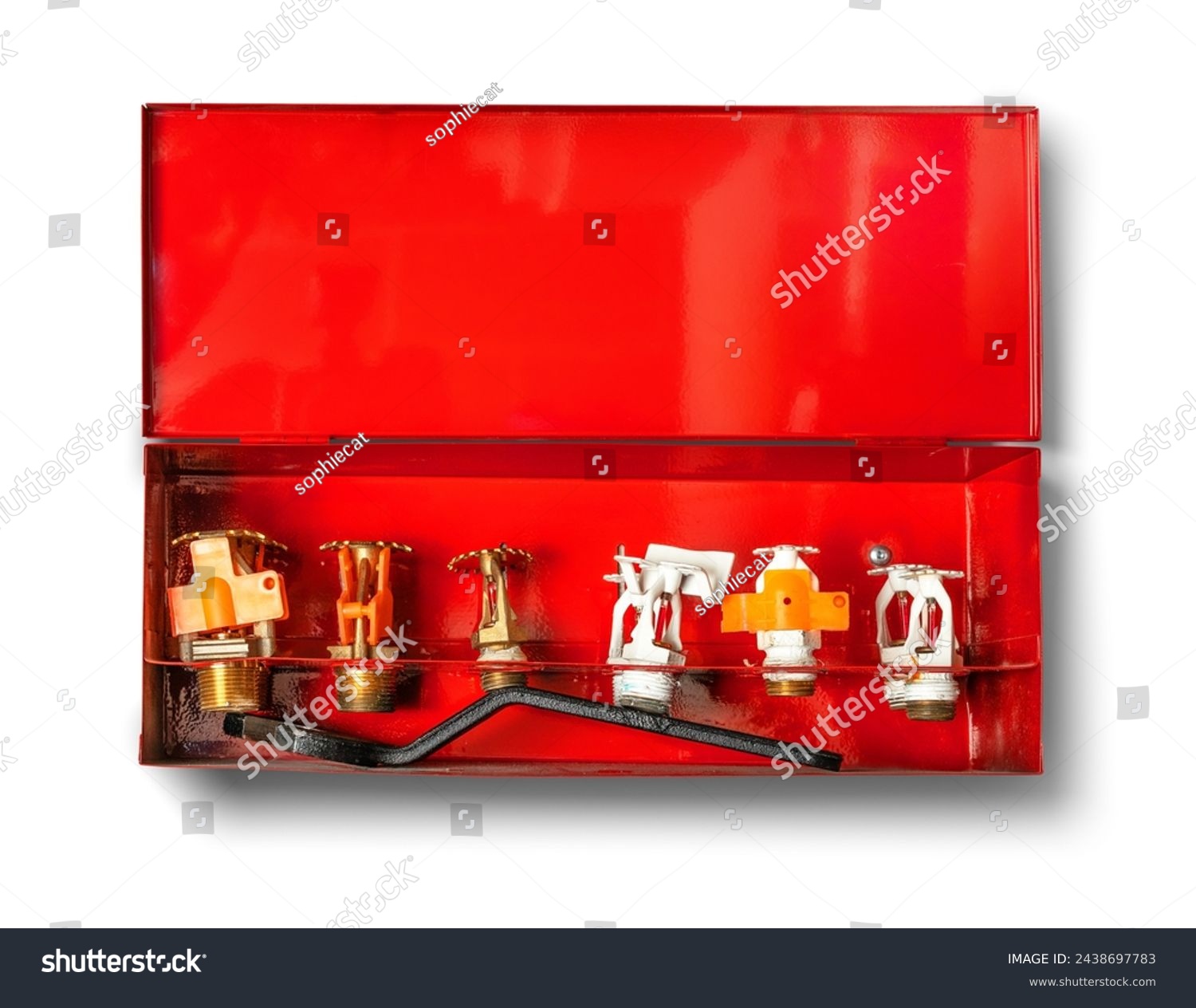 Wet fire sprinkler head replacement cabinet. 6 sprinkler heads with wrench in box. Assortiment of fire sprinkler heads for underground parking sprinkler system. Selective focus. White background.  #2438697783