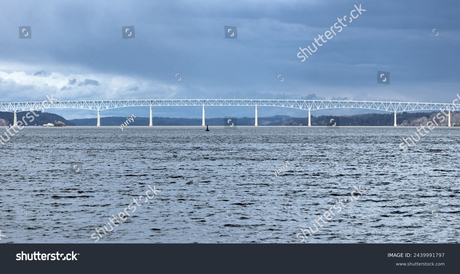 view of the Kingston-Rhinecliff Bridge from Kingston point beach (continuous under deck truss toll bridge across hudson river in new york state) #2439991797