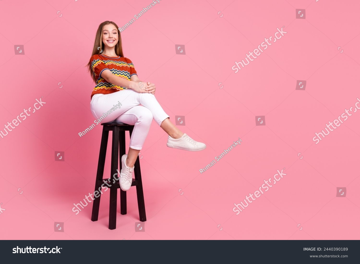 Full body portrait of satisfied glad cute person sit chair empty space ad isolated on pink color background #2440390189