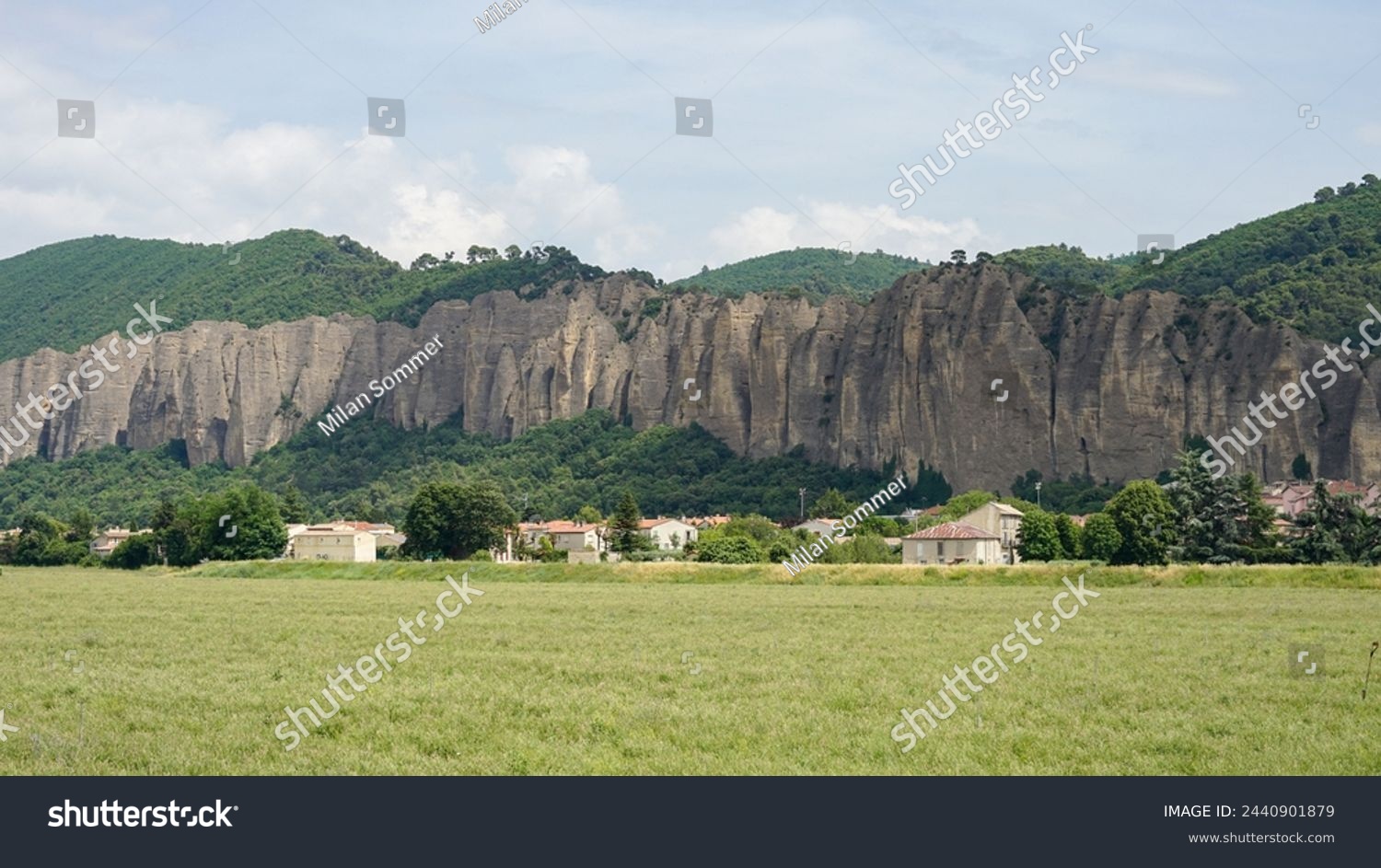 Penitents des Mees, interesting rock cliffs above village Mees, tourist landmark in France #2440901879