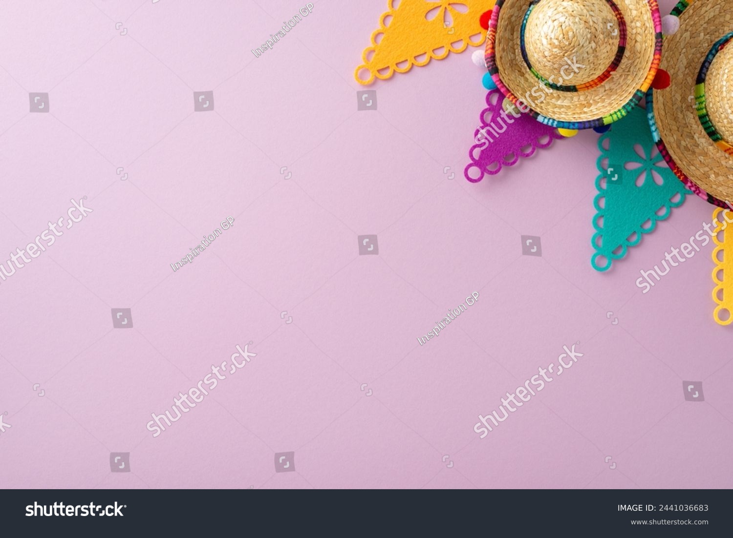 Cinco de Mayo essence. Top-down view capturing festive elements: sombreros, flag decor, arranged on a pastel purple surface, with space for words #2441036683
