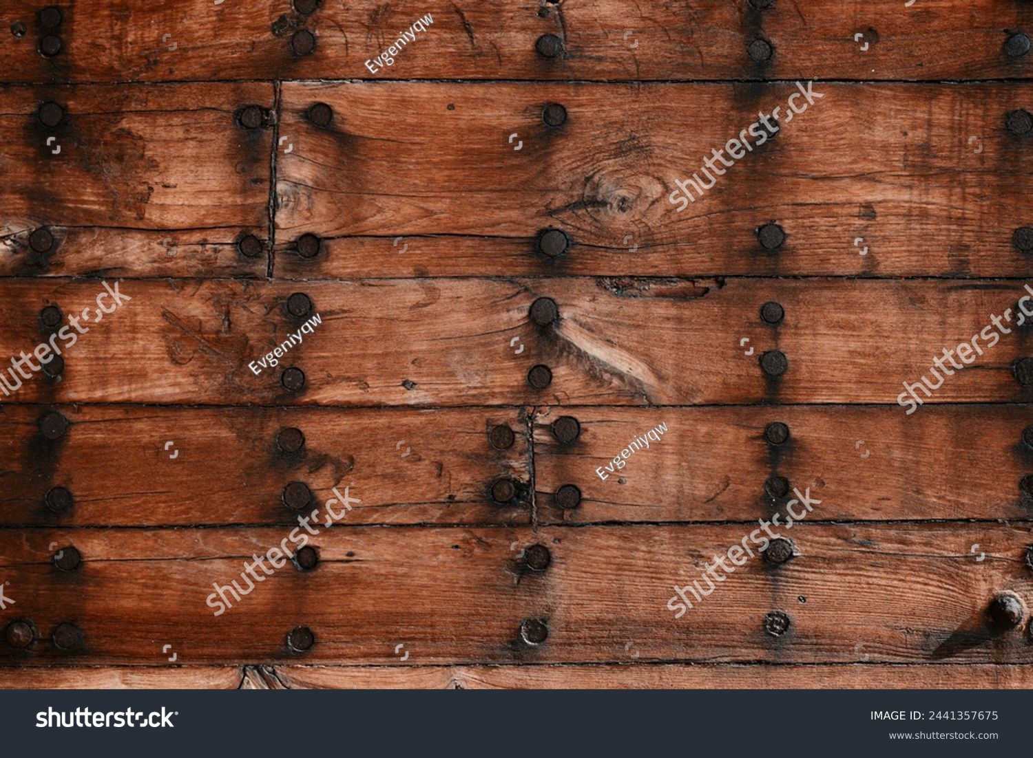 Construction of a wooden ship. Shipyard of traditional Dhow wooden boat on Iranian Qeshm Island. Board of Tradition Lenz Fishing Boat in Southern Iran. Old wooden stealth smuggler's ship. #2441357675