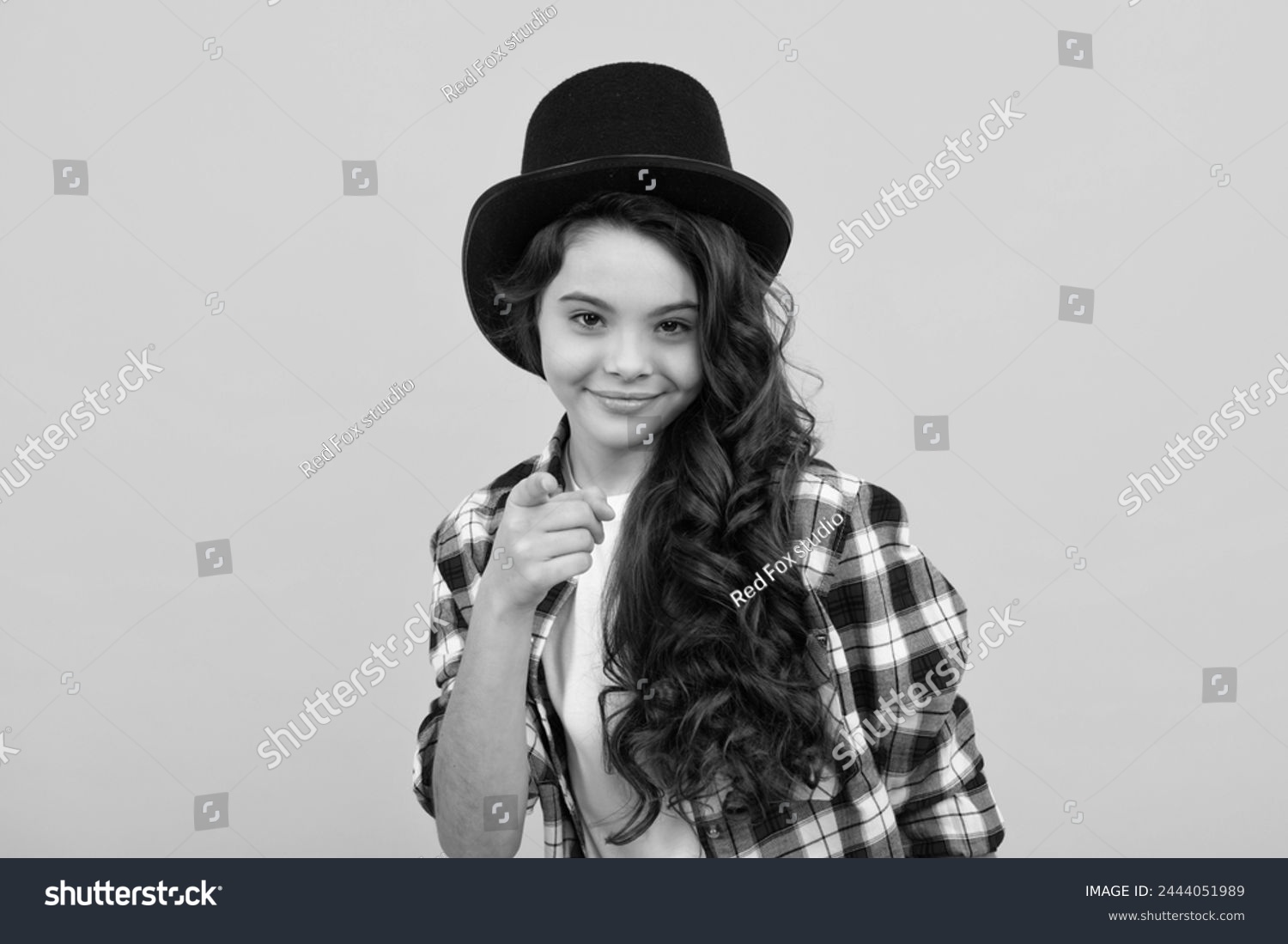 Teenager girl in magician hat, cylinder hat isolated on yellow background. Headwear. Clothes accessories. Fashion headwear for gentlemen in vintage style, old classic cylinder. #2444051989