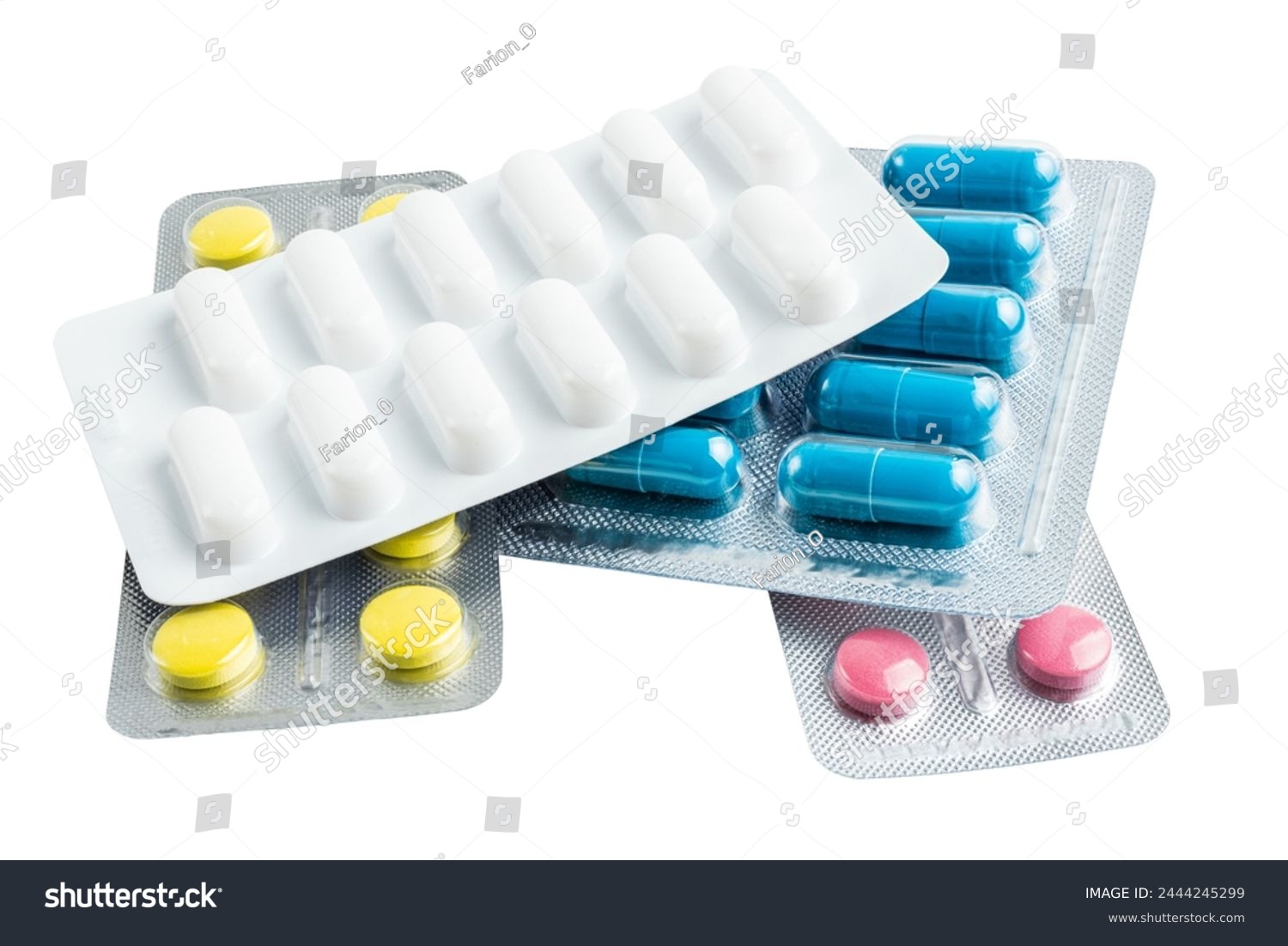 Various medicine capsules, pills and tablets in a blister pack isolated on white background, healthcare and medicine concept. #2444245299