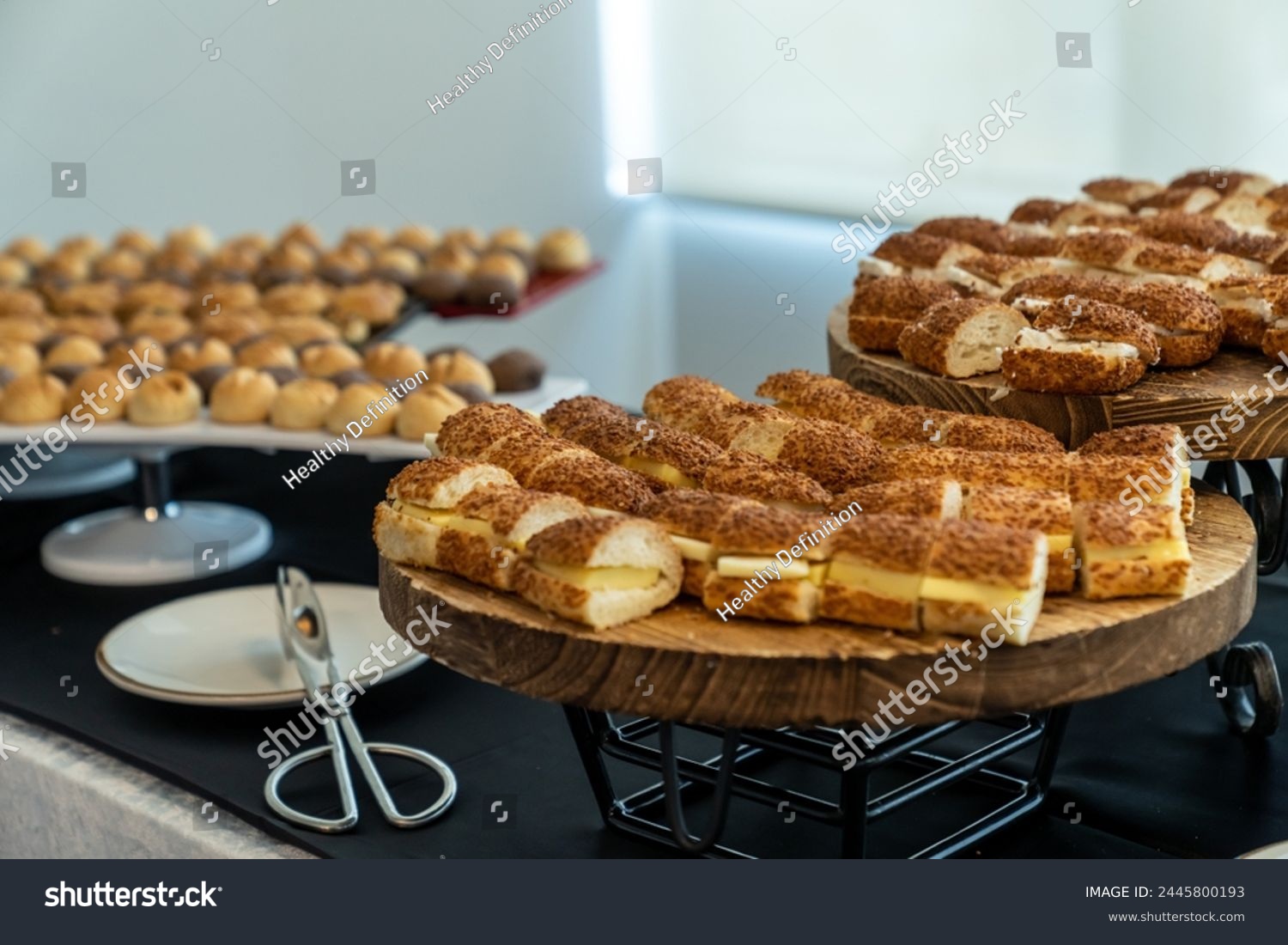 coffee break hotel during conference meeting, corporate revent with tea and coffee catering, decorated catering banquet table with variety of different pastry and bakery, with croissants and cookies #2445800193
