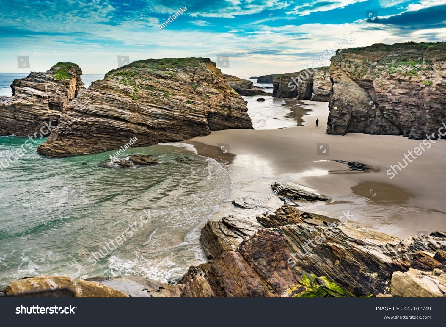 Cliff formations on Cathedral Beach in Galicia Spain. Playa de las Catedrales, As Catedrais in Ribadeo, province of Lugo. Cantabric coastline in northern Spain. Tourist attraction. #2447102749