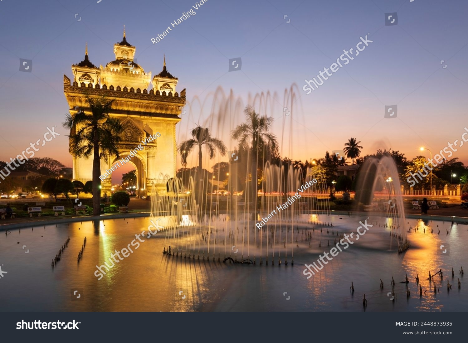 Patuxai Victory Monument (Vientiane Arc de Triomphe) and fountain floodlit at dusk, Vientiane, Laos, Indochina, Southeast Asia, Asia #2448873935