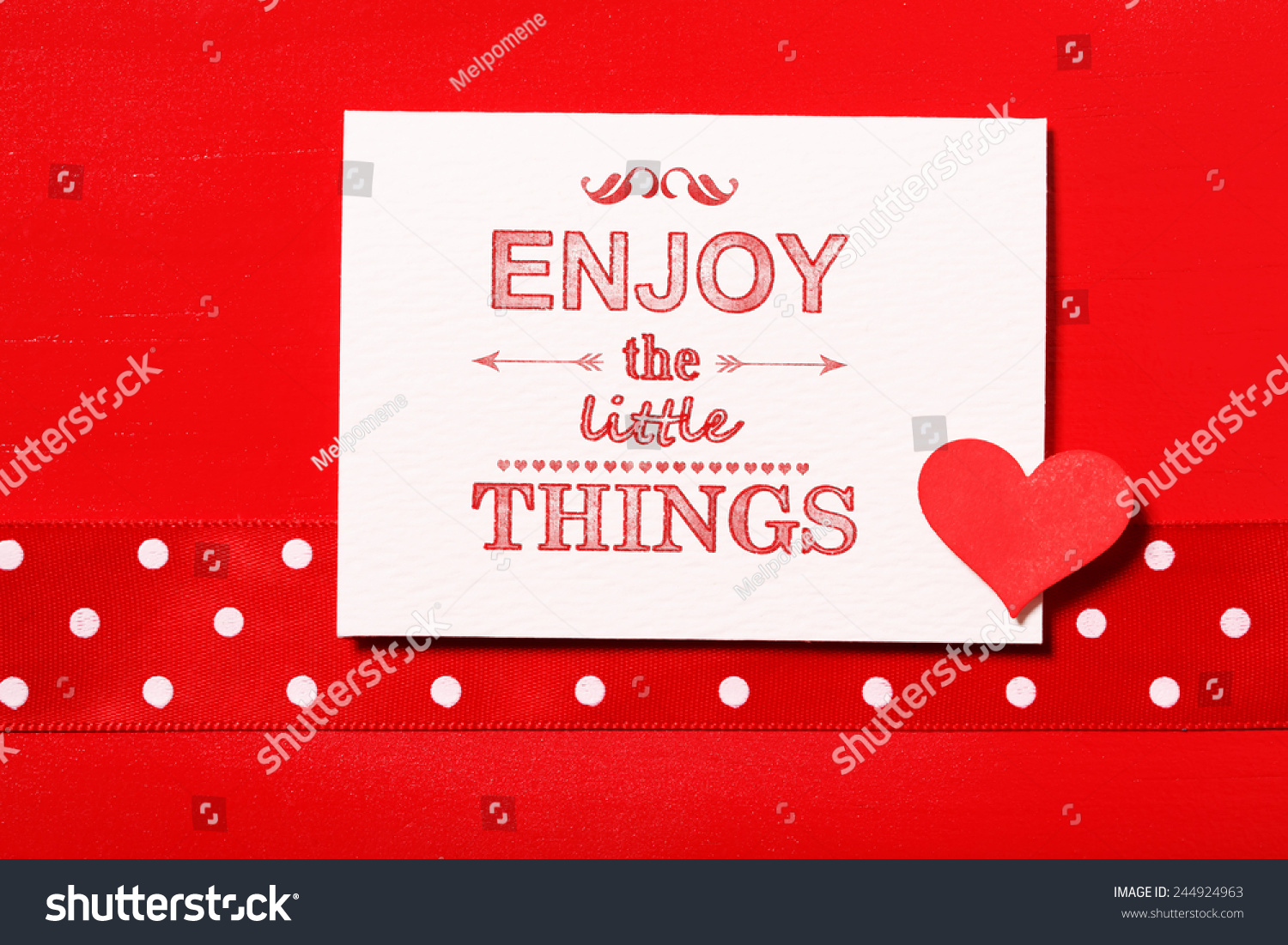 Enjoy the little things text with small red heart #244924963