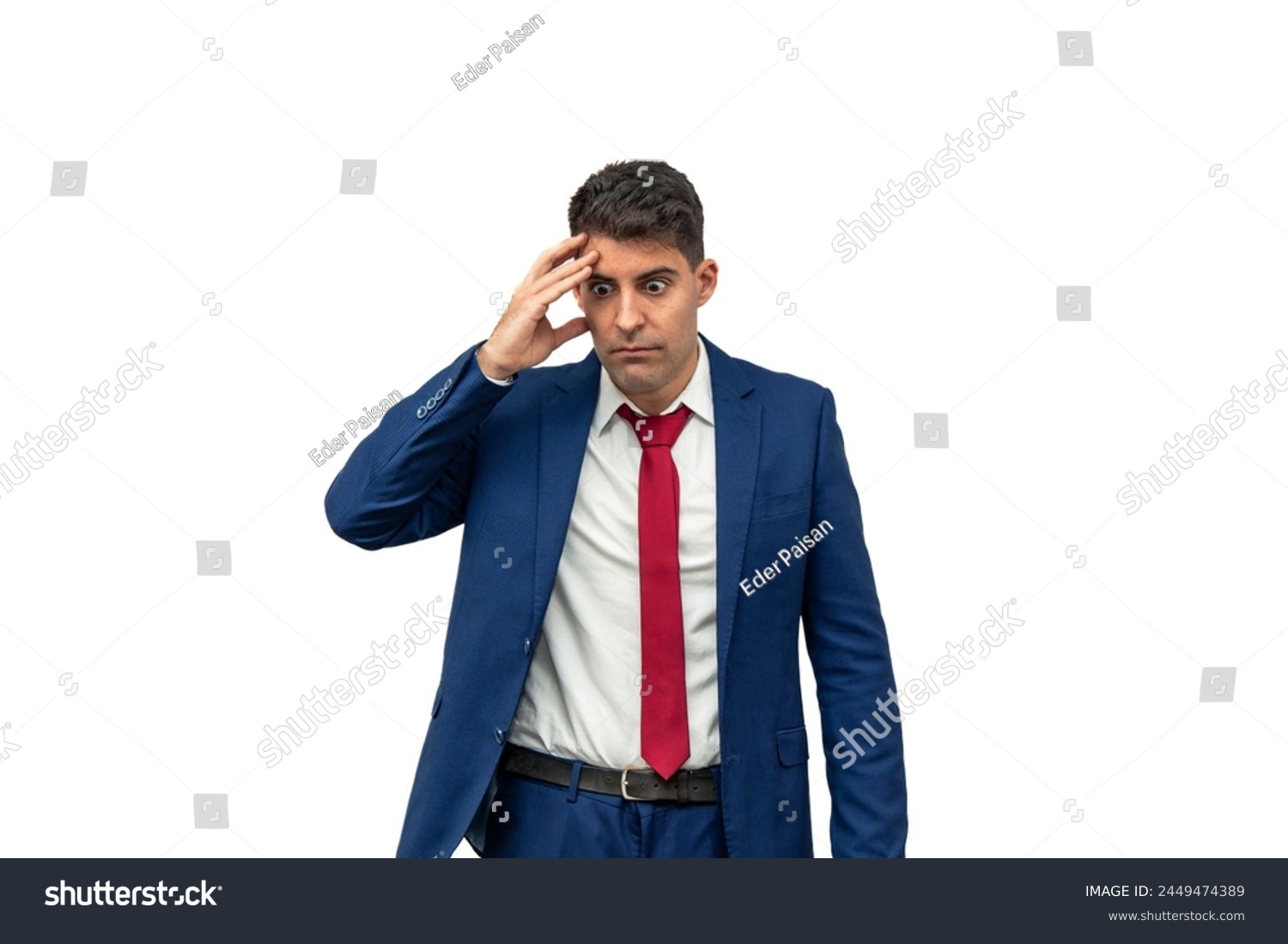 emorseful expression of a businessman as he places his hand on his temple, displaying guilt and regret for his irresponsibility. With a culpable demeanor,  embodies remorse and regret white background #2449474389