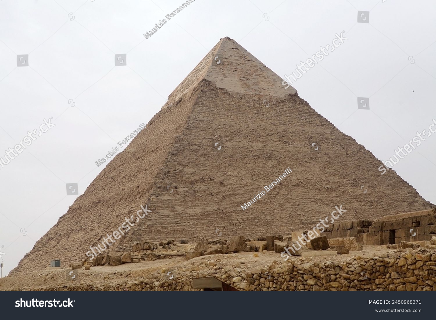 The Pyramid of Khefre at the Giza Pyramid Complex in Giza, Egypt, also called the Giza Necropolis. It was built during the Fourth Dynasty of the Old Kingdom #2450968371