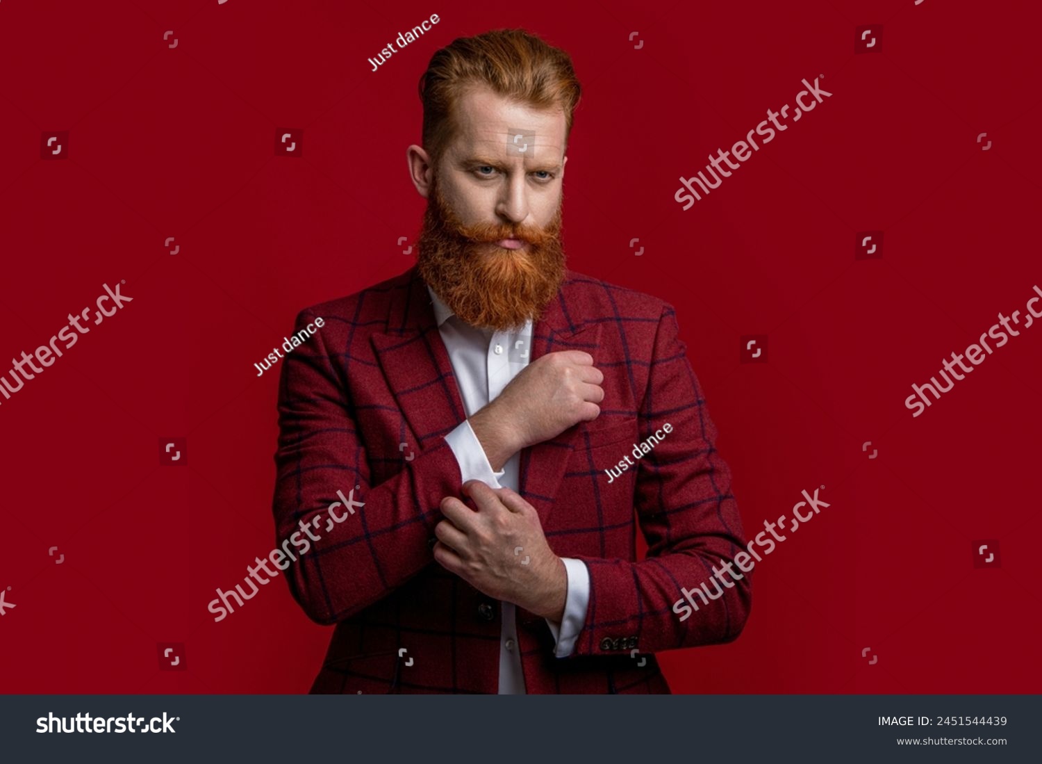 Elegance of bearded gentleman in formal suit. Formalwear. Tux man in formalwear isolated on red. Redhead man in formalwear tuxedo. Man wear elegant formal menswear. Black-tie tuxedo #2451544439