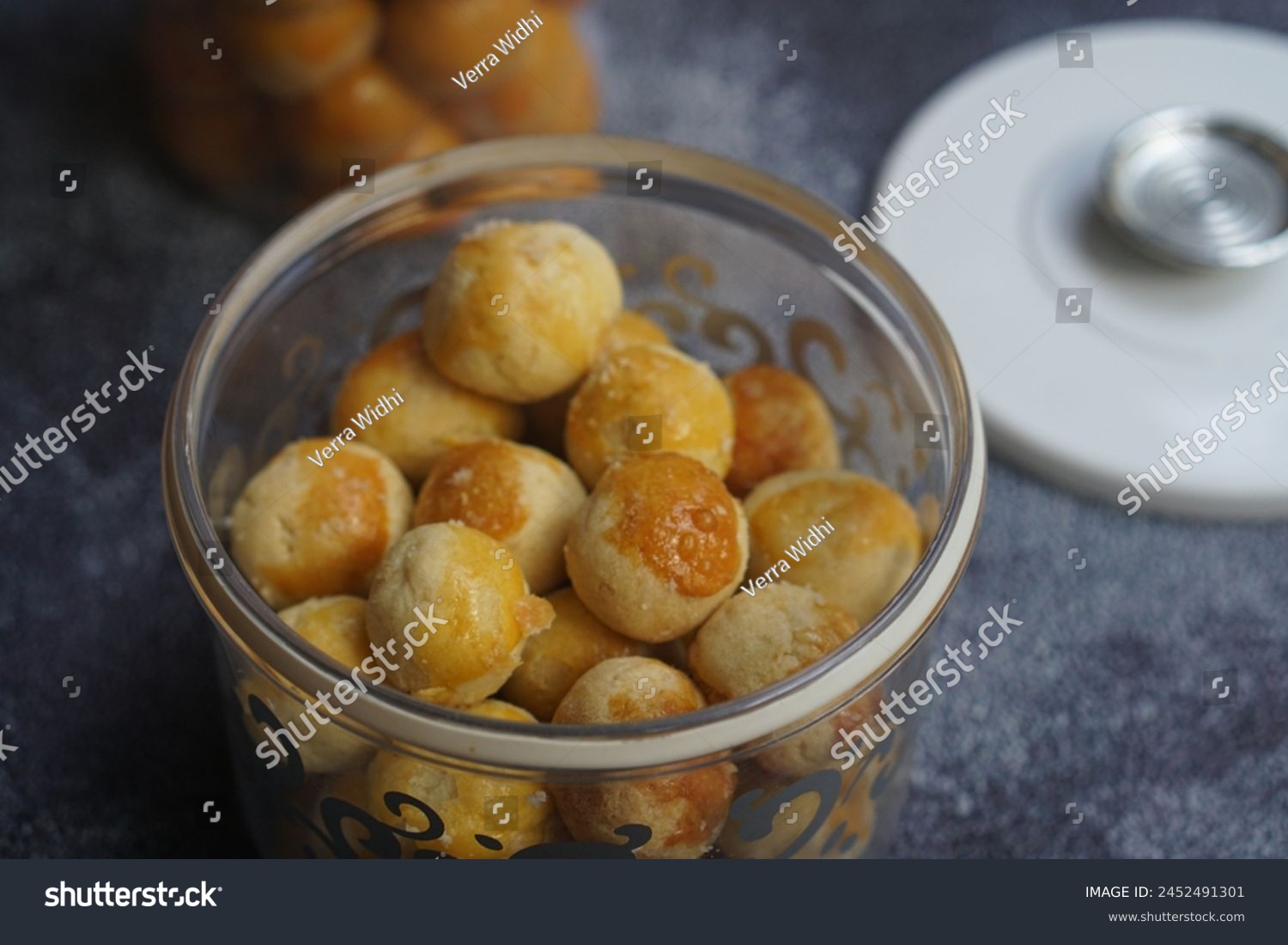 Nastar Cookies, Pineapple tarts or nanas tart are small, bite-size pastries filled or topped with pineapple jam, commonly found when Hari Raya or Eid Al Fitr or Lebaran. Selective focus. #2452491301