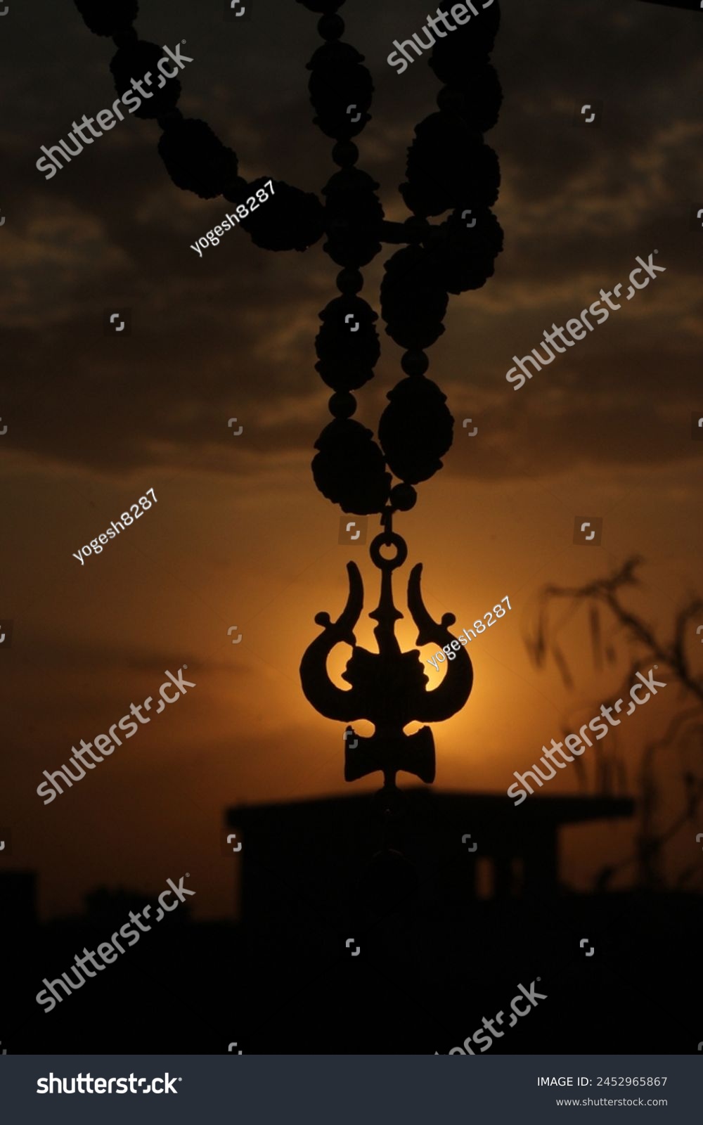 Lord Shiva Trishul with Sun set #2452965867