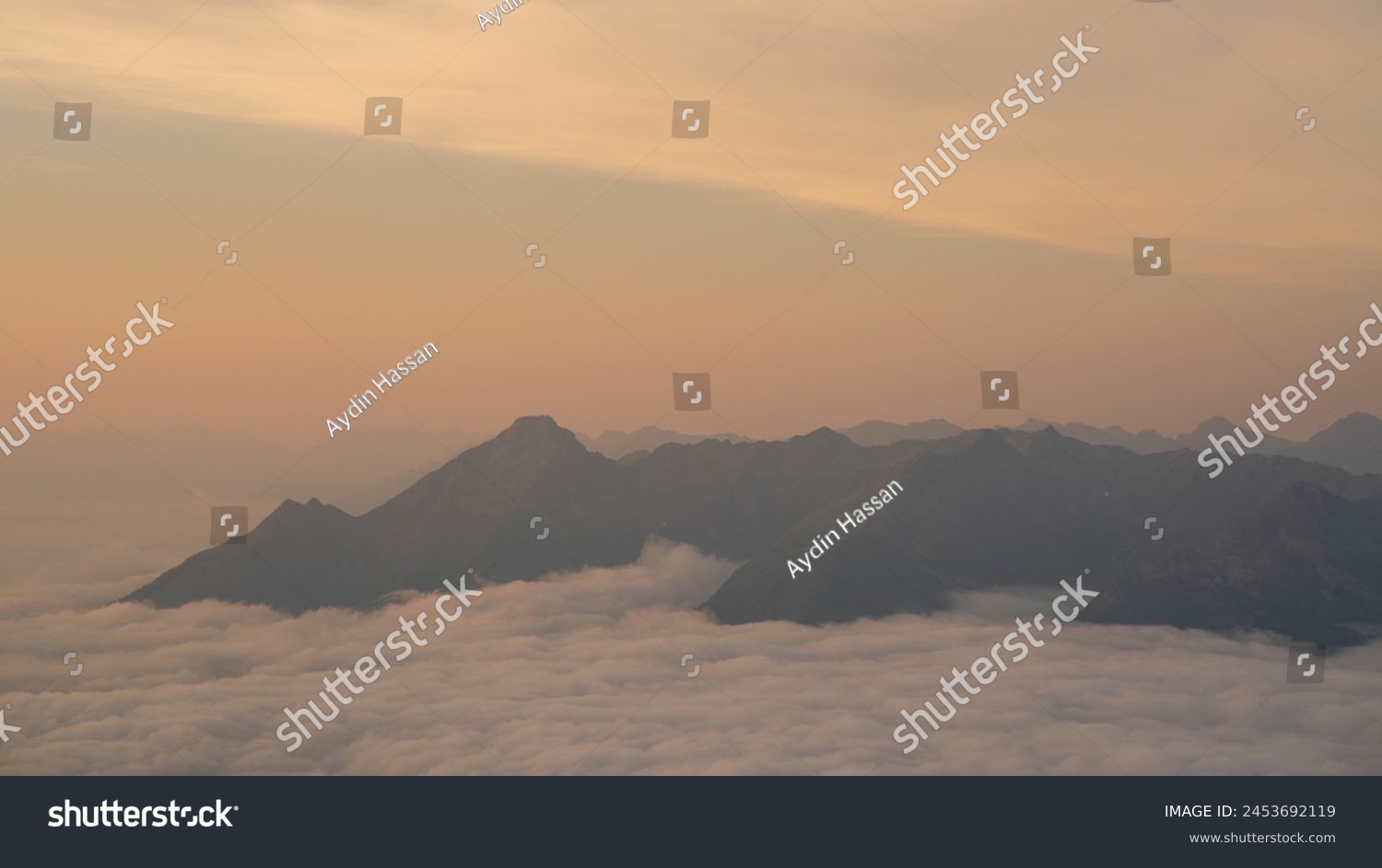 Golden summer sunrise over a cloud inversion in the Hohe Tauern National Park, Osttirol, Austria #2453692119