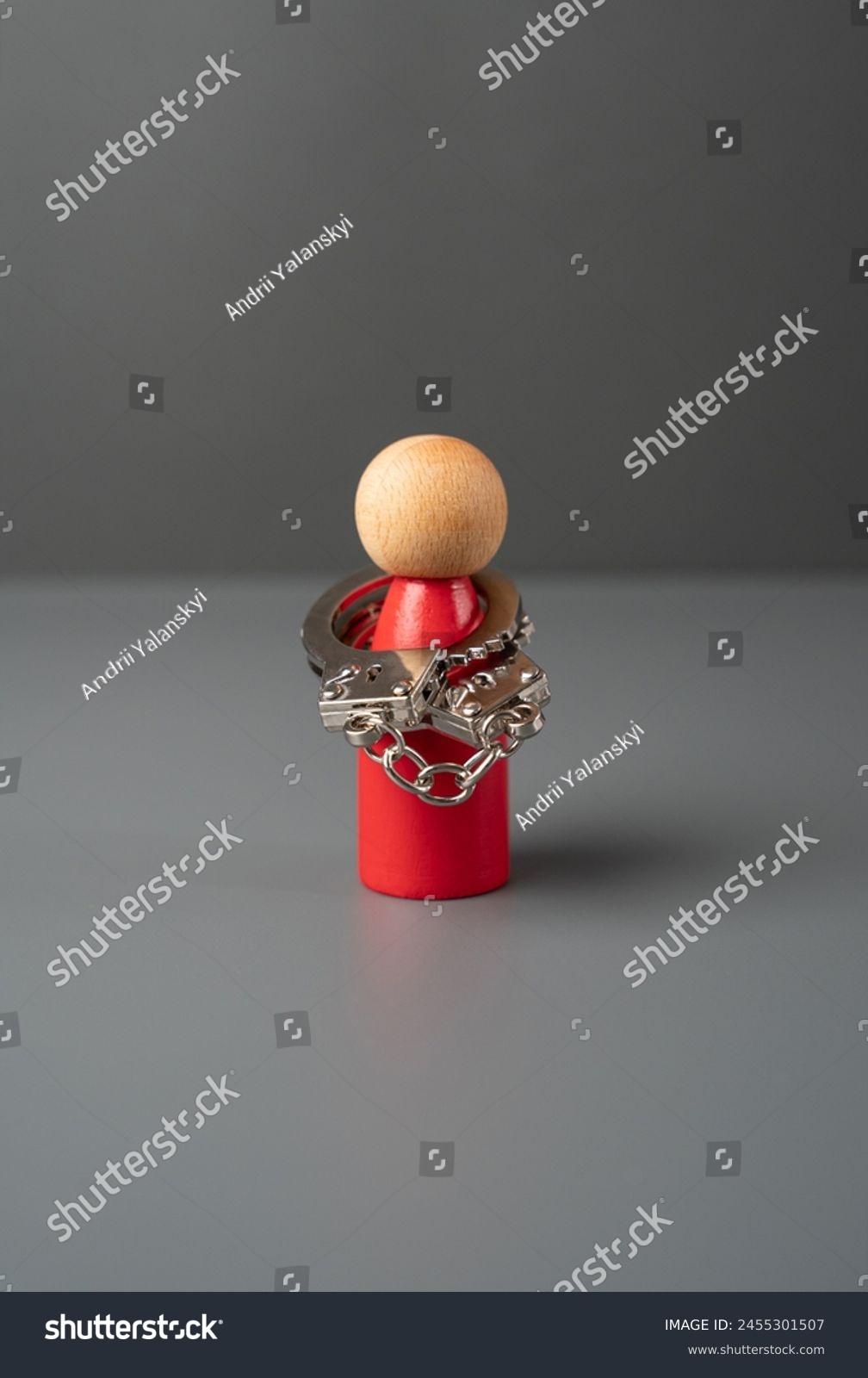 Man figurine in handcuffs. Mental health. Limitations and psychological problems. Stiffness and tightness. Find self-confidence. Throw off the shackles, liberate yourself. Remove fears and prejudices #2455301507