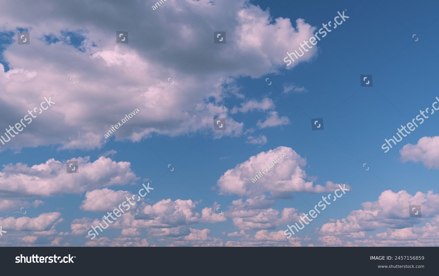 Purple Afternoon Sky And Clouds. Background Of Blue Sky With Pale Pink Clouds At Day. #2457156859