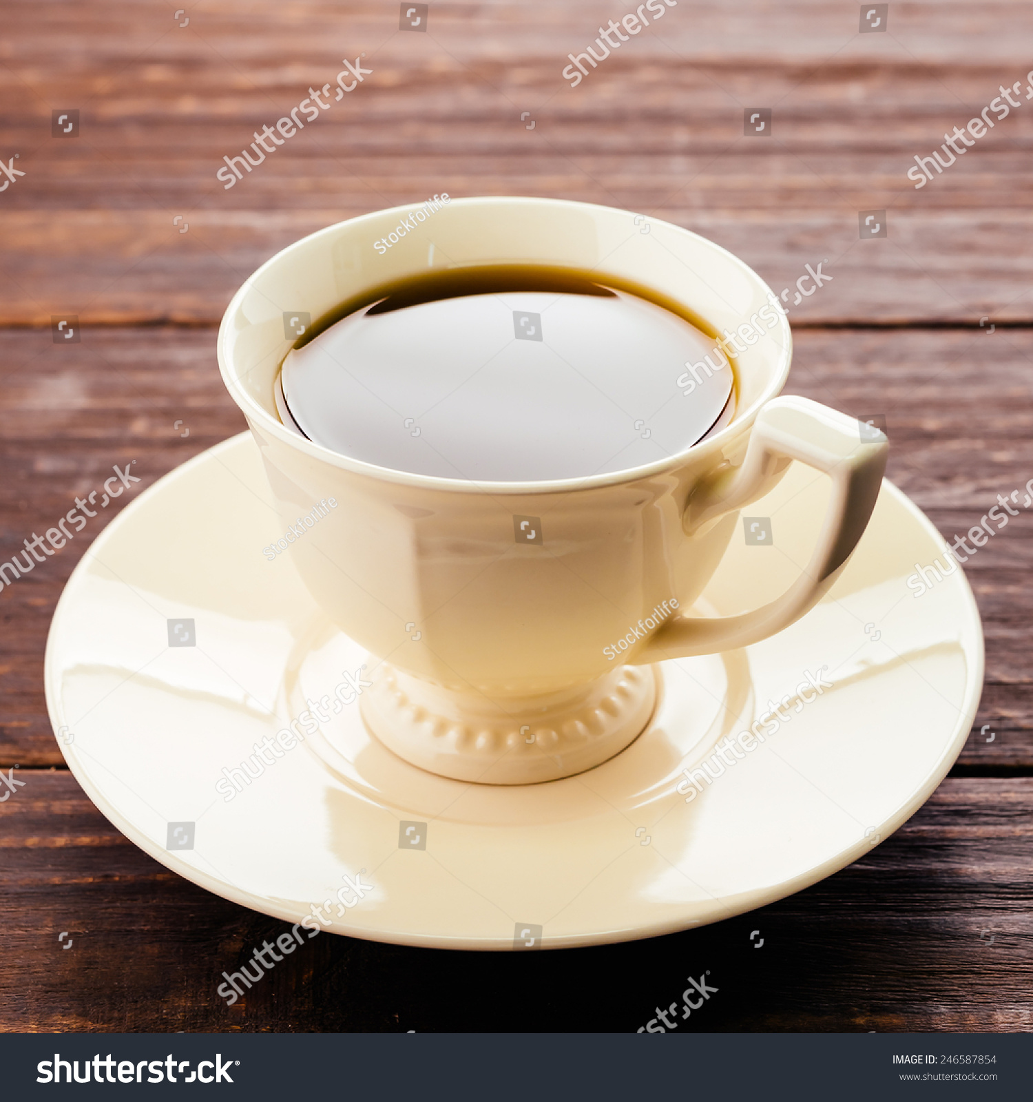 Coffee mug on wood background - Vintage effect style pictures #246587854