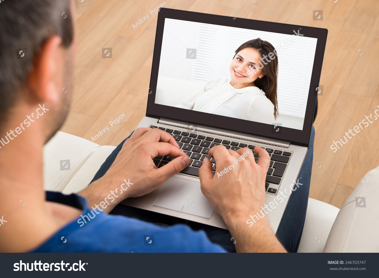 Man Having A Videochat With Woman On Laptop #246703747