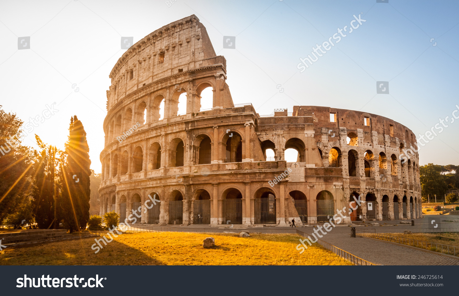 Colosseum at sunrise in Rome, Italy, Europe. Rome ancient arena of gladiator fights. Rome Colosseum is the best known landmark of Rome and Italy #246725614