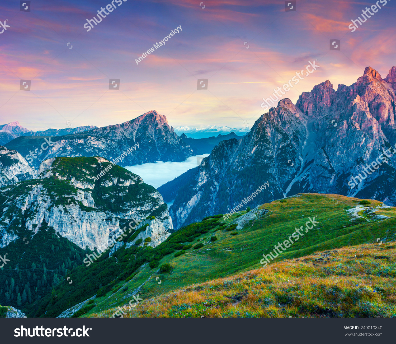 Colorful sunrise on the Seekofel mountain range in National Park Tre Cime di Lavaredo. Dolomites, South Tyrol. Location Auronzo, Italy, Europe. #249010840