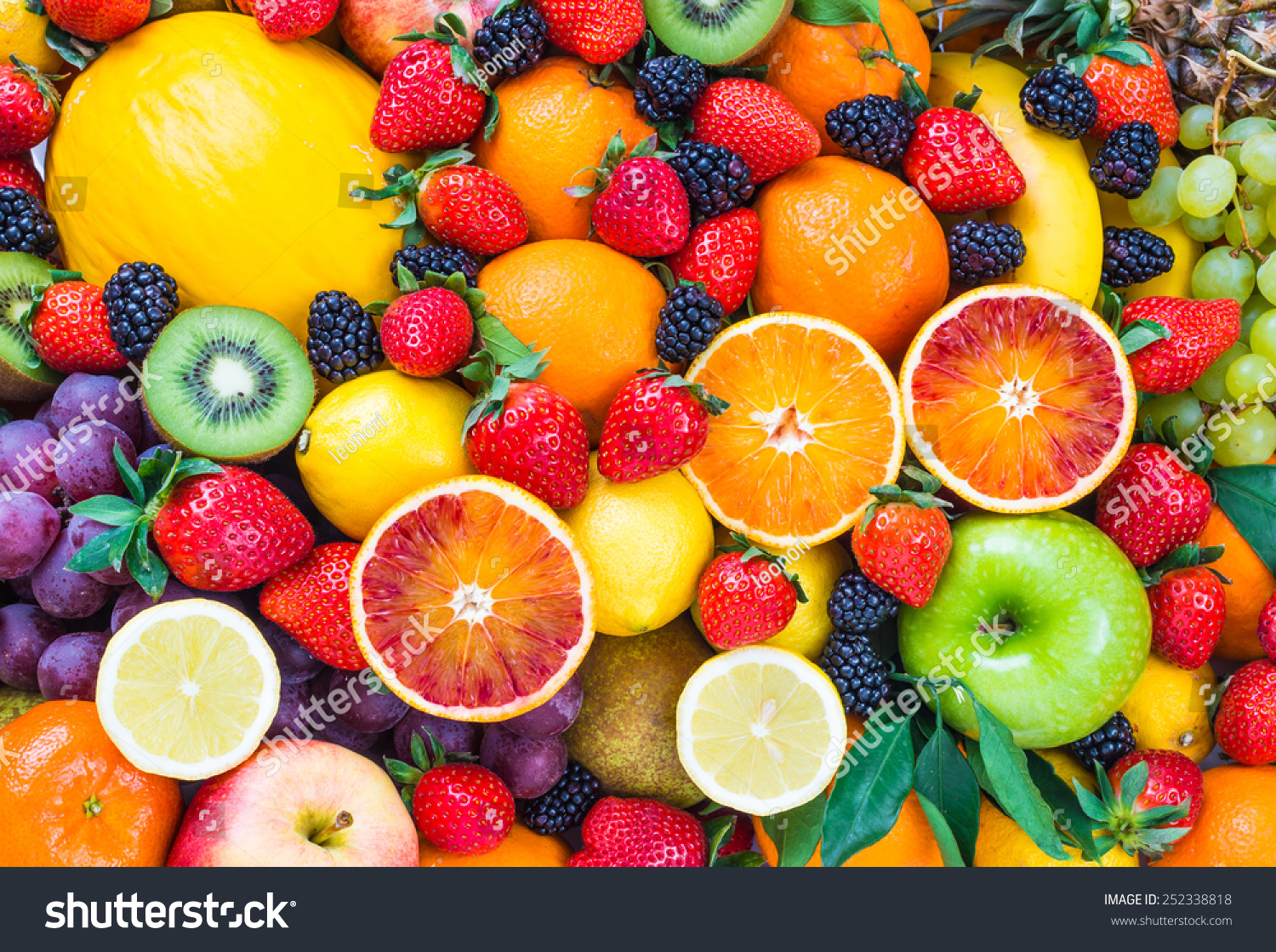 Fresh fruits assorted fruits colorful background.Vitamins natural nutrition concept. #252338818