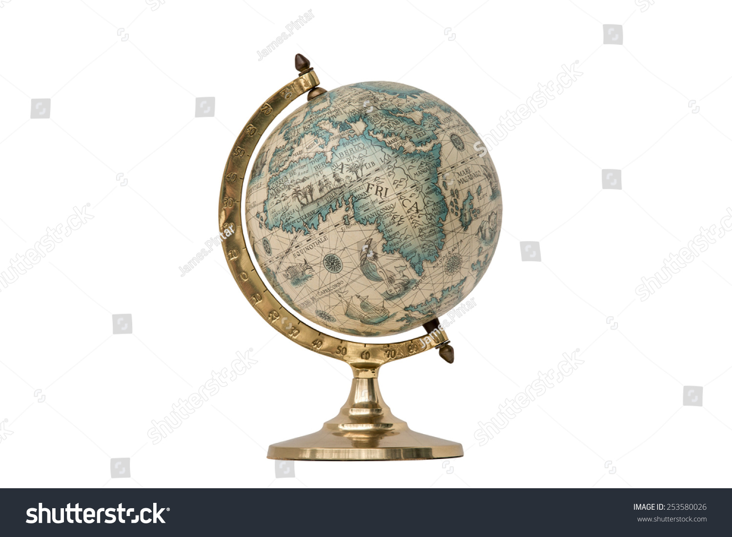 Old Style World Globe - Antique world globe isolated on white background.  Studio close up.  Showing Africa and some of Middle East. #253580026