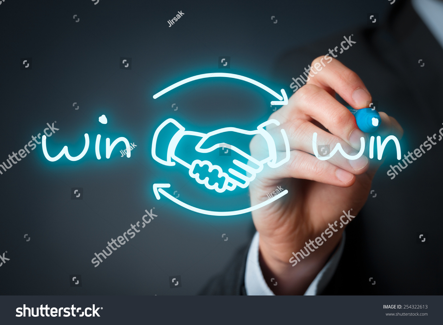 Win-win partnership strategy concept. Businessman draw win-win scheme with handshake partnership agreement. #254322613