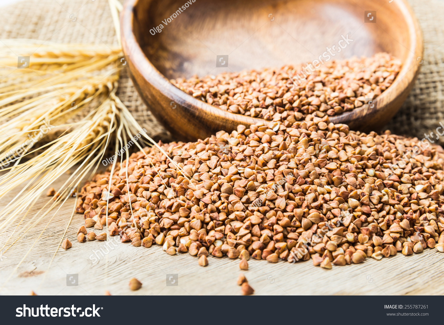 Bowl with Buckwheat on a wooden background #255787261
