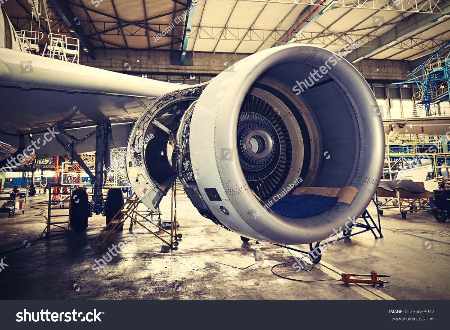 Engine of the airplane under heavy maintenance #255838942
