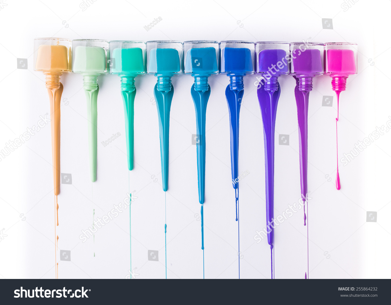 rainbow of nail polish isolated on a white background #255864232