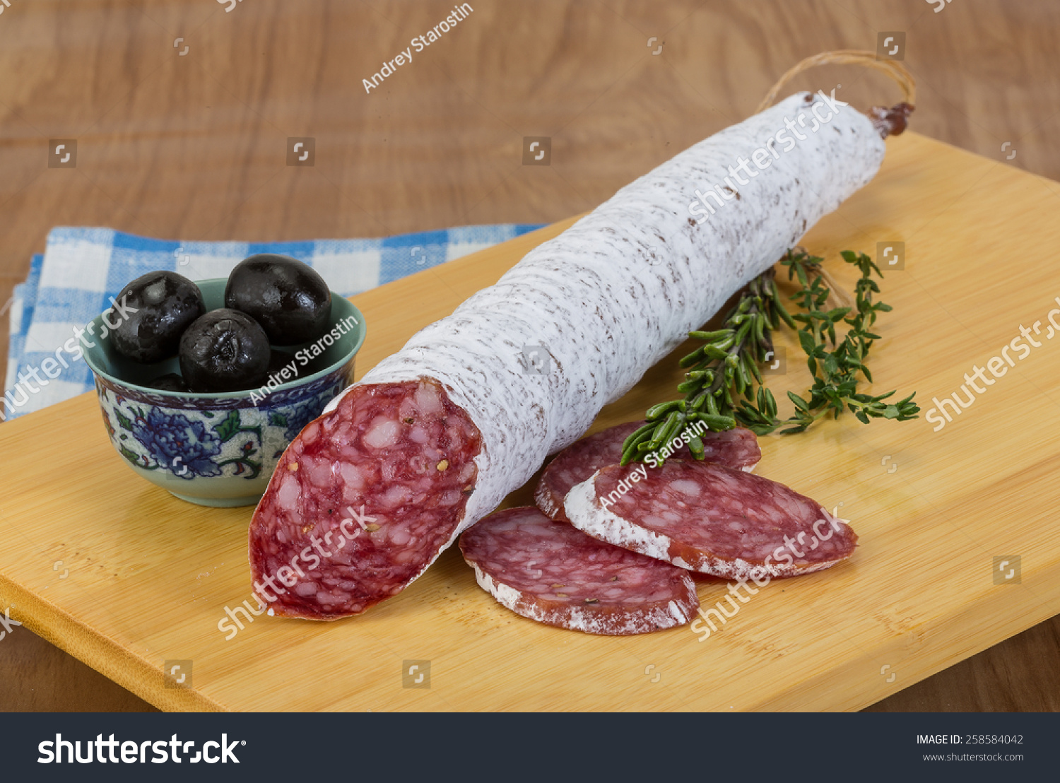 Fuet sausage - Spanish meat sliced with herbs - Royalty Free Stock ...